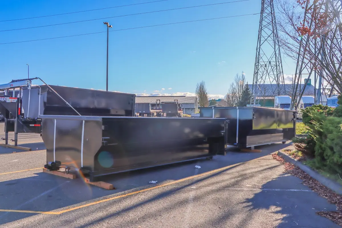 Roll-off dumpster ready for waste disposal at job site for Construction Dumpster Rental in Nibley